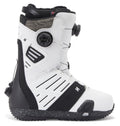 A pair of DC Shoes Men’s Judge Step On BOA® Snowboard Boots in a white and black colorway, featuring textured details, ventilation slits, a BOA® Fit System dial closure, and a rugged black sole. The boot is positioned upright and viewed from the side.