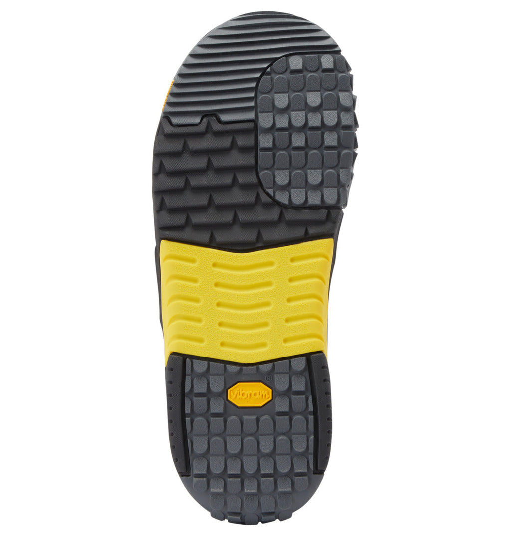 Black and yellow outsole with a textured tread pattern, including grooves, raised blocks, and an orange Vibram logo at the center bottom—perfectly designed for the DC Shoes Men’s Phantom BOA® Snowboard Boots equipped with the BOA® Fit System for a secure fit.