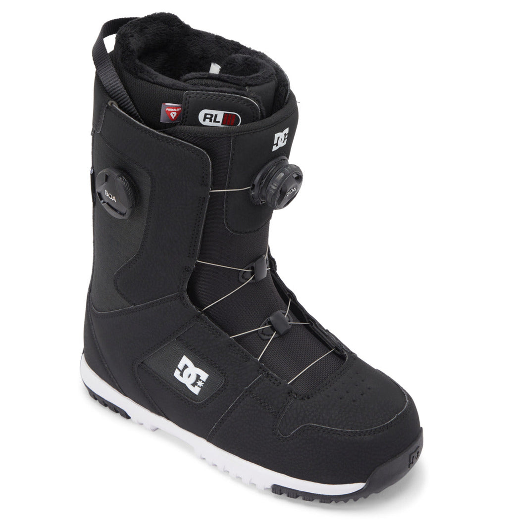 A single black Men’s Phase Pro BOA® Snowboard Boot by DC Shoes features a white sole, a BOA dial lacing system, the DC logo on the side, and padded interior lining for comfort and support. Enhanced with PrimaLoft insulation, this boot is designed to keep your feet warm and dry in any conditions.