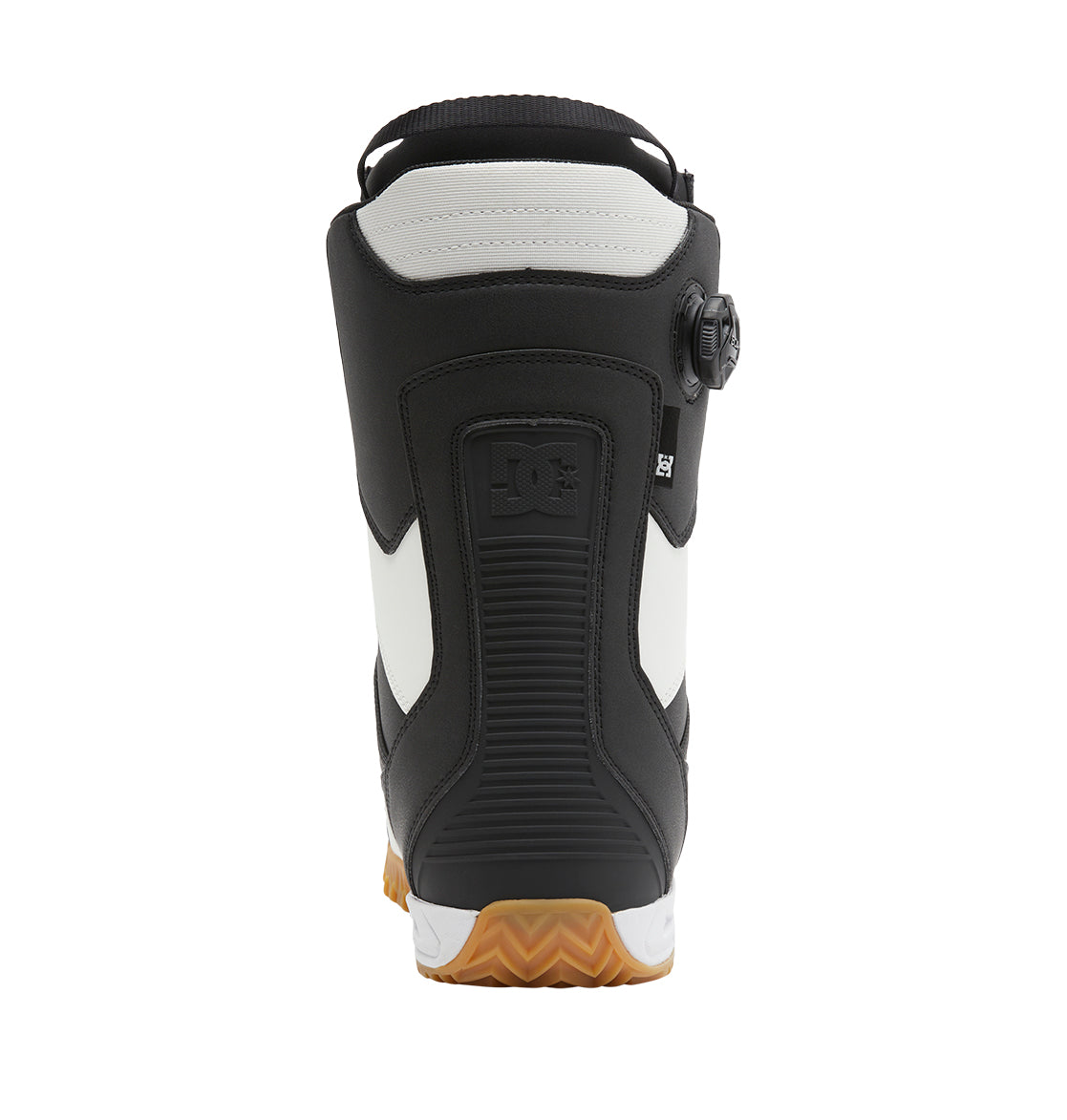 A rear view of the Men’s Transcend BOA® Snowboard Boots by DC Shoes showcases a black and white all-mountain design with a textured heel, a prominent logo patch, and a rubber sole featuring a brown wavy tread pattern.