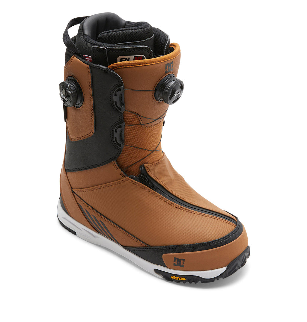 A single DC Shoes Men’s Transcend BOA® all-mountain snowboard boot in brown and black, featuring dual adjustment dials with the BOA® Fit System, a black interior lining, and a white-and-black sole. The DC logo is visible near the toe.
