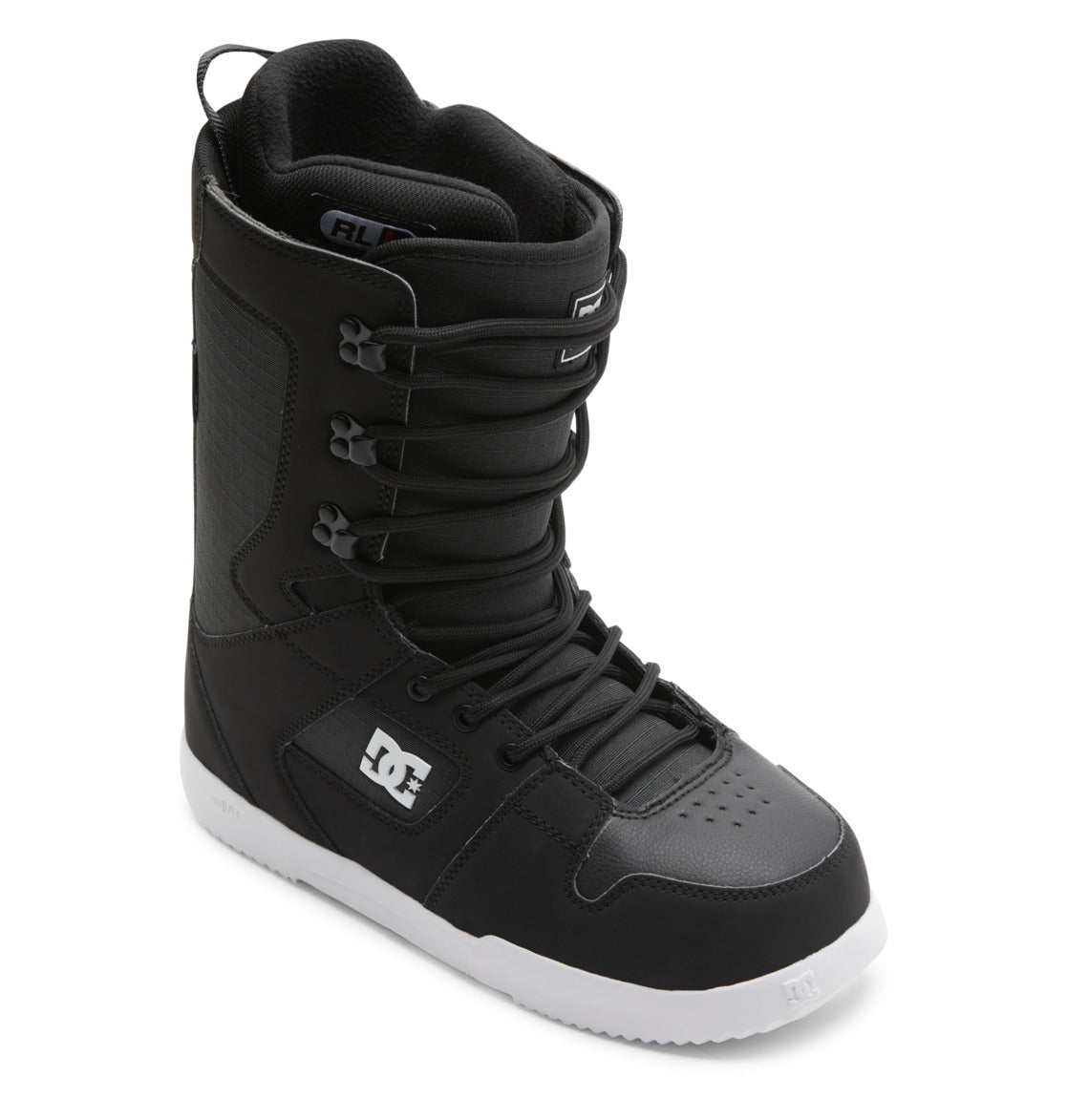 The image shows a single DC Shoes Men’s Phase Lace Snowboard Boot in black and white, featuring a traditional lace closure, medium flex, and the DC logo on the side, displayed against a white background.