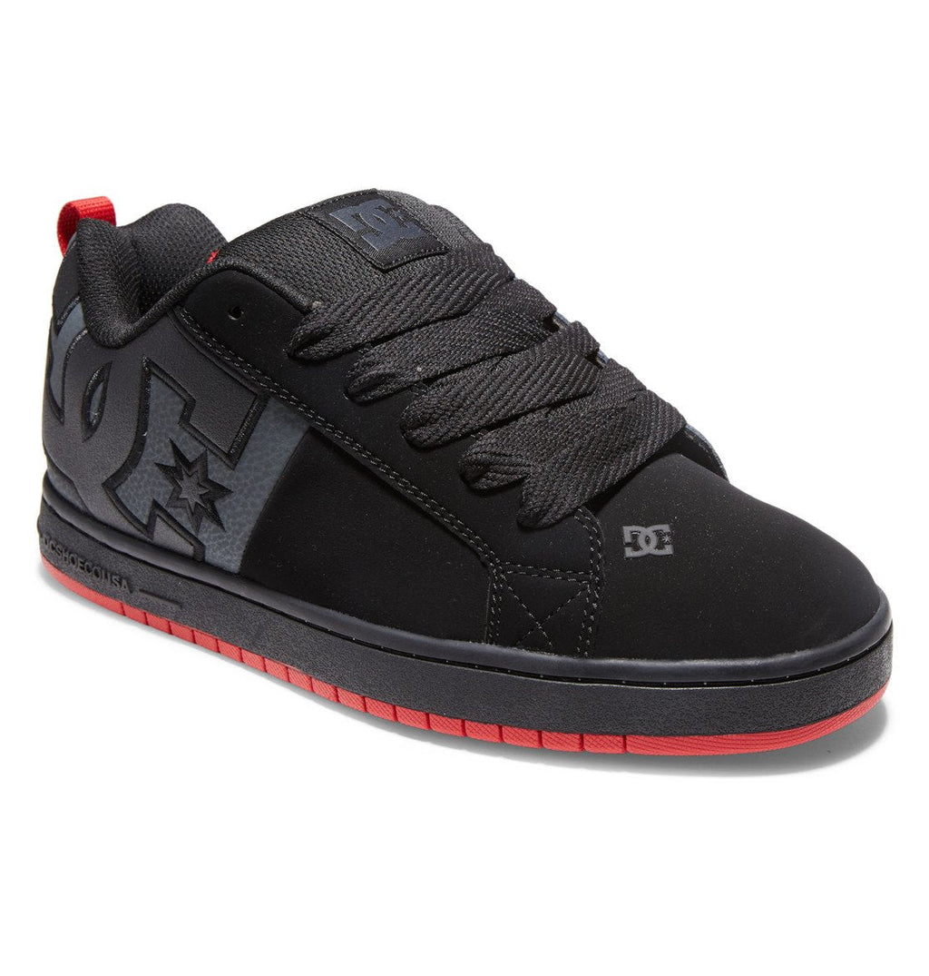 Introducing the Men’s Court Graffik Shoes by DC Shoes—a bold black sneaker featuring a puffy silhouette, thick laces, eye-catching red outsole, and the signature large DC Star Logo on the side. Designed for comfort and style, these shoes also include a padded tongue and subtle star detail near the heel, making them a standout piece in any men’s footwear collection.