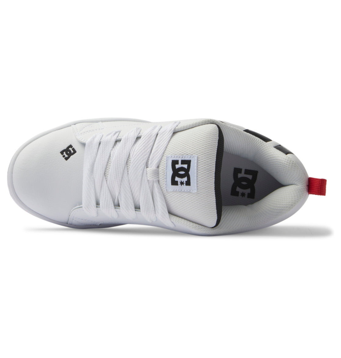 The Men’s Court Graffik Shoes from DC Shoes are shown from above, featuring white laces, a DC Star Logo on the tongue, and a bold red pull tab at the heel. With their clean, minimalist design accented by subtle black branding details and an eye-catching two-tone sole, these stylish men’s shoes offer modern appeal for any wardrobe.