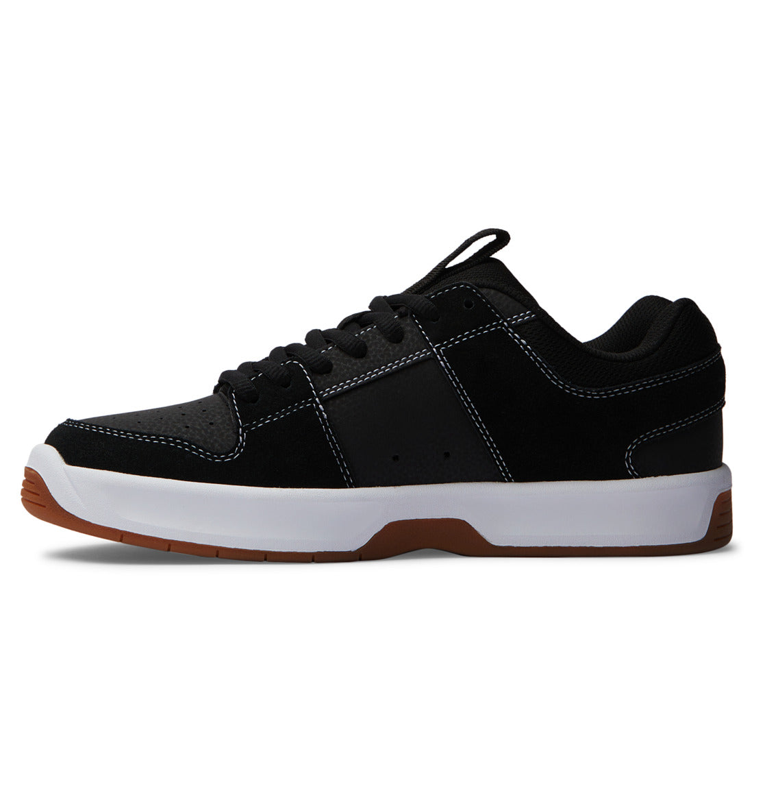 Men’s Lynx Zero Shoes by DC Shoes feature a black low-top design with white stitching, a white midsole, and a brown rubber outsole—offering a modern spin on iconic skate footwear, pictured in a side profile against a plain white background.