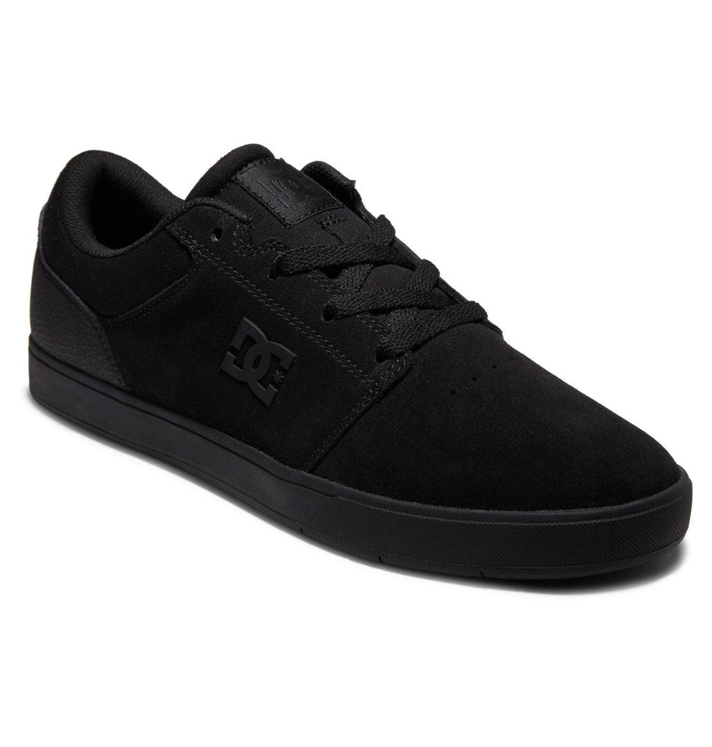 Introducing the Men’s Crisis 2 Shoes by DC Shoes—a black skate shoe crafted with a suede finish, featuring matching black laces and the signature DC logo on the side. Designed for skateboarding, these shoes offer a low profile and a flat rubber performance cup sole for excellent grip andboard feel.