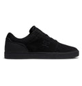 A side profile of the Men’s Crisis 2 Shoes by DC Shoes is shown in black, featuring a low-top silhouette, a performance cup sole, and subtle branding on the side, photographed against a white background.