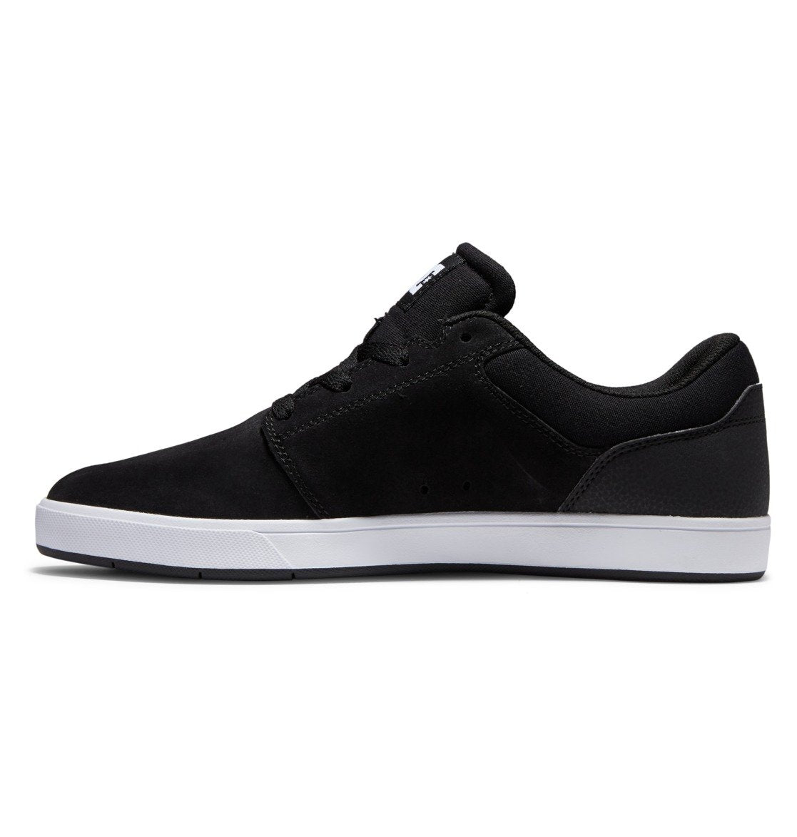 The Men’s Crisis 2 Shoes by DC Shoes are displayed in a left side profile view against a plain white background. This black low-top sneaker with a white sole showcases a performance cup sole for enhanced support, delivering a modern look and making it an ideal choice for those seeking affordable skate shoes.