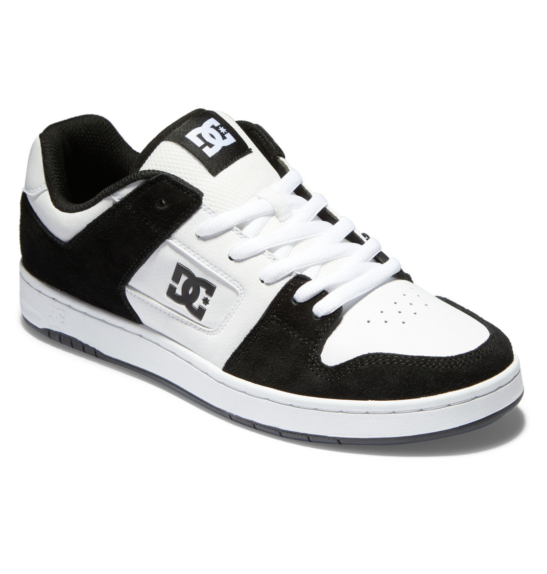 The Men’s Manteca 4 Shoes by DC Shoes feature a black and white design with white laces, black suede accents, a white DC logo on the side, and a white and gray sole, all crafted for modern comfort.