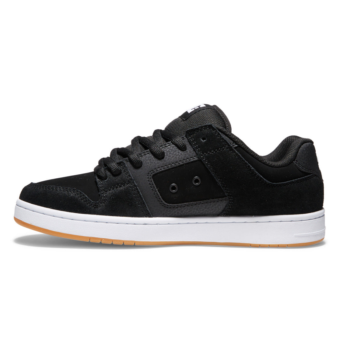 The Men’s Manteca 4 Skate Shoes by DC Shoes are low-top skate sneakers in black and dark gray, featuring a durable cupsole construction, a white outer sole, and a gum-colored bottom. The shoes are displayed in a side profile view against a plain white background.