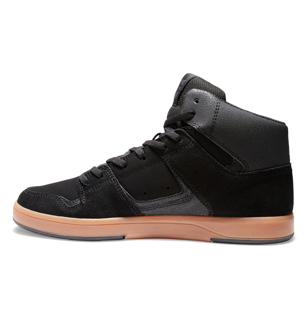 The Men’s DC Pure High-Top Shoes by DC Shoes are black leather high-top sneakers with black laces, textured panels, and a light brown rubber sole, shown in a left side profile view on a white background.