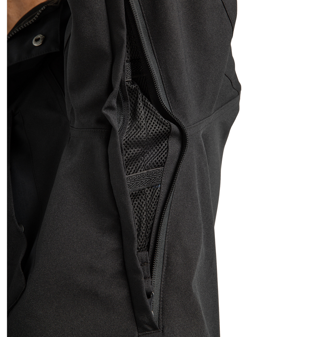 Close-up of the underarm area on the DC Shoes Men’s Tundra Insulated Jacket, featuring an open zippered mesh ventilation vent for enhanced breathability.