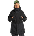 A person wearing the DC Shoes Men’s Tundra Insulated Jacket in black, paired with black pants and ski goggles, stands facing forward with hands in the jacket’s chest-high pockets against a plain white background.
