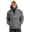 A person wearing the DC Shoes Unisex Nexus Reversible Insulated Anorak Jacket in gray, paired with a tan beanie and ski goggles, stands with hands in pockets against a plain white background.