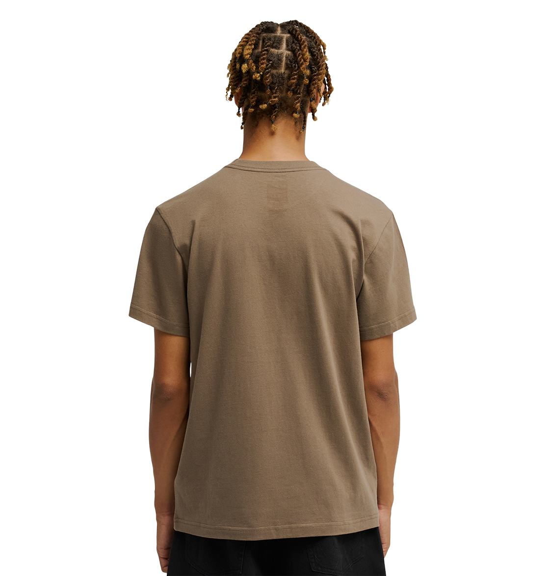 A person with short, twisted hair faces away, wearing the Men's DC Star Tee by DC Shoes in taupe and black pants against a white background.