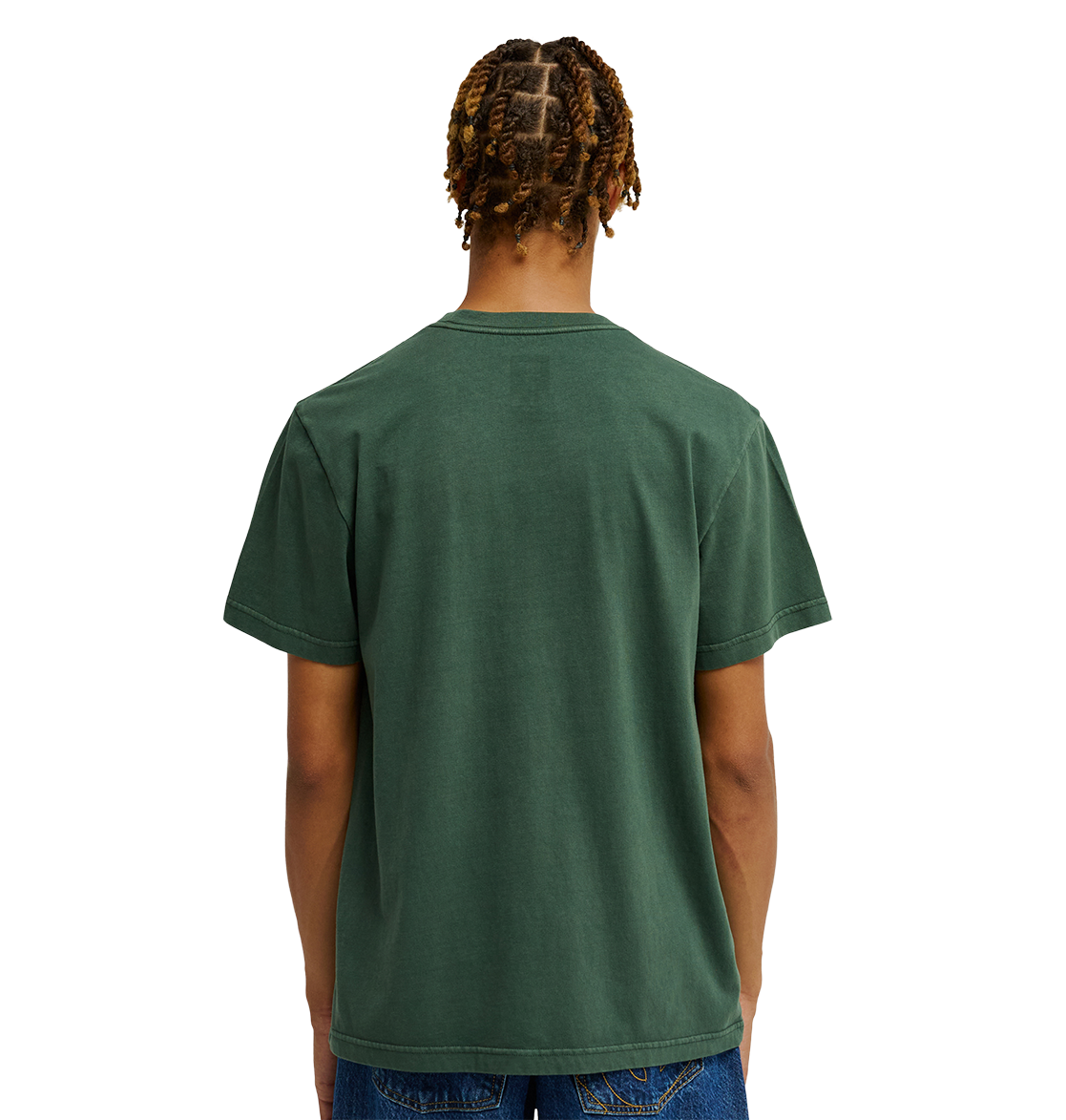 A person with short, twisted hair is shown from the back against a plain white background, wearing the DC Shoes Men's DC Star Pigment Dye Tee in dark green paired with blue jeans.
