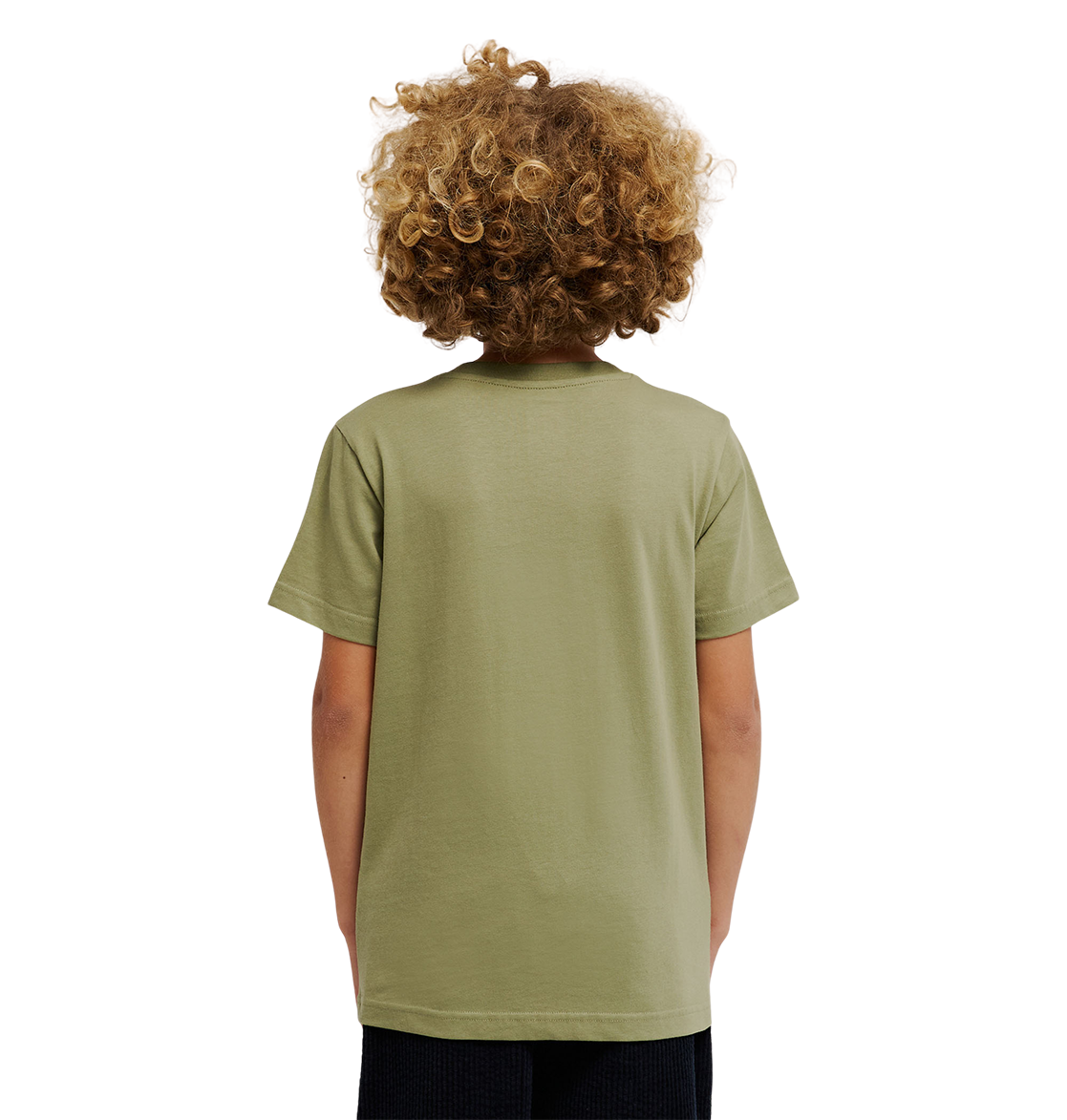 A child with curly blond hair, wearing the DC Shoes DC Star Filled Tee Youth in light olive-green cotton and dark shorts, stands facing away from the camera against a plain white background.