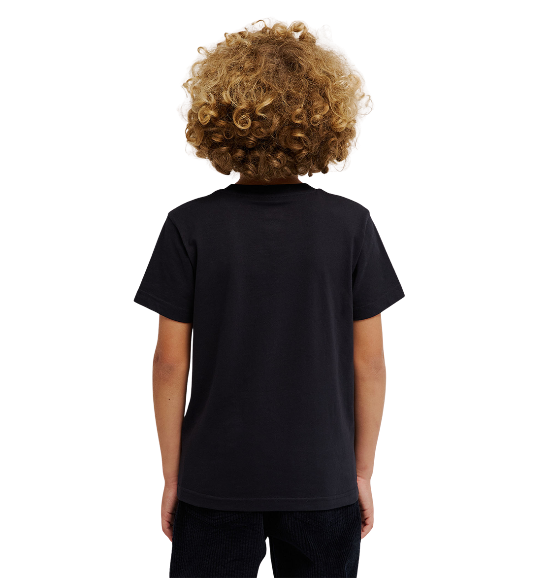 A child with curly blonde hair is standing facing away, wearing a DC Shoes DC Star Filled Tee Youth in black and black pants against a light background.