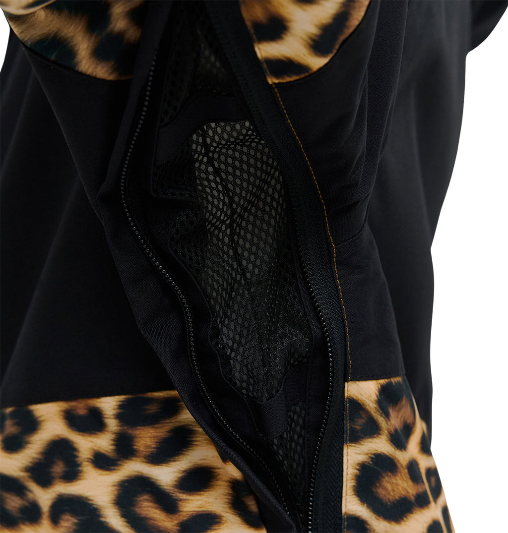 Close-up of the DC Shoes Cruiser Jacket in black, featuring a mesh zipper opening and leopard print accents along the edges.