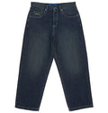 The Men’s Worker Baggy Denim Double That Jeans by DC Shoes are heavyweight dark blue denim jeans with a relaxed, 90s skate-style fit. They feature five pockets, silver button and rivets, and a small green and black patch above the right front pocket. The baggy denim jeans are displayed laid flat on a white background.