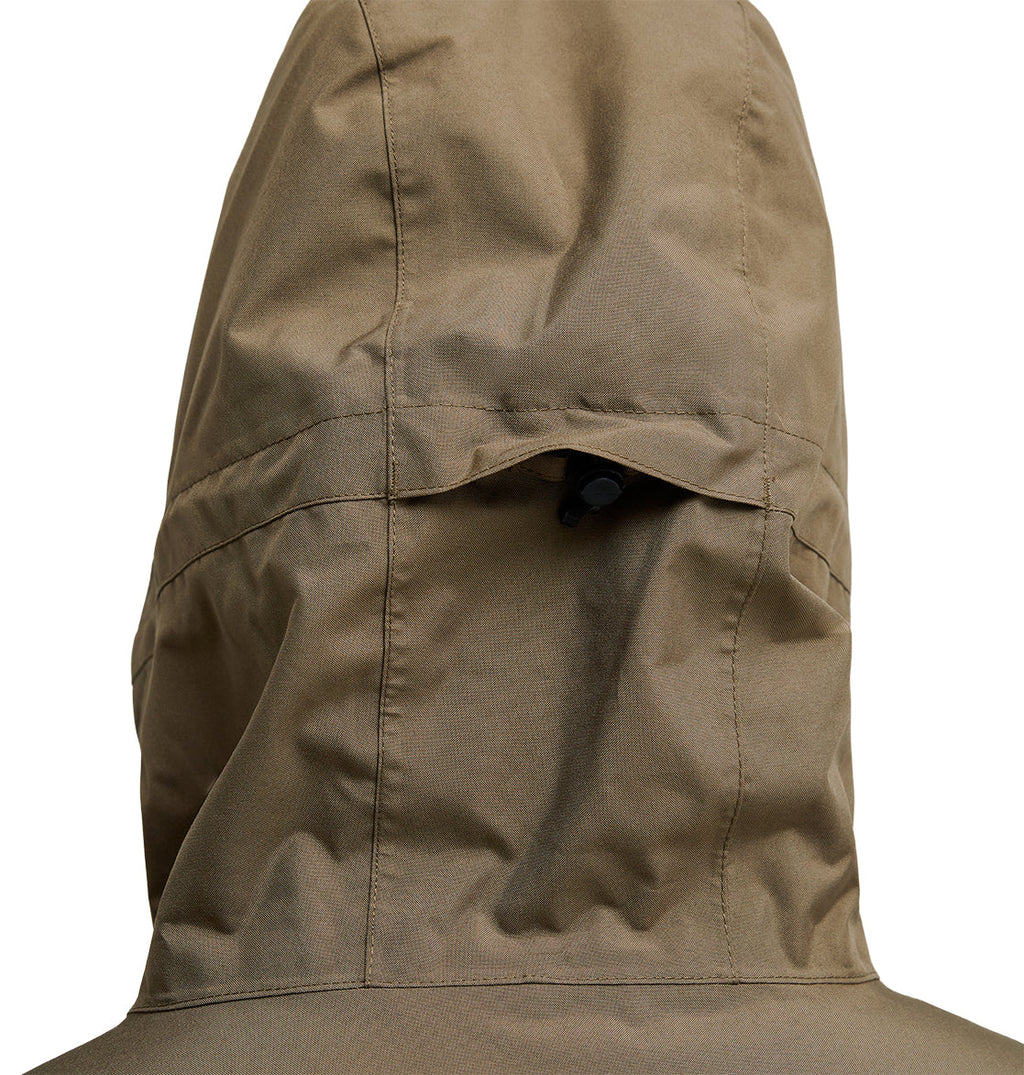 Close-up of the back of the tan DC Shoes Basis Jacket 10K, highlighting the stitching details and an adjustment tab near the top center of the hood. This jacket features 10K waterproof protection and breathable fabric, making it ideal for changing weather conditions.