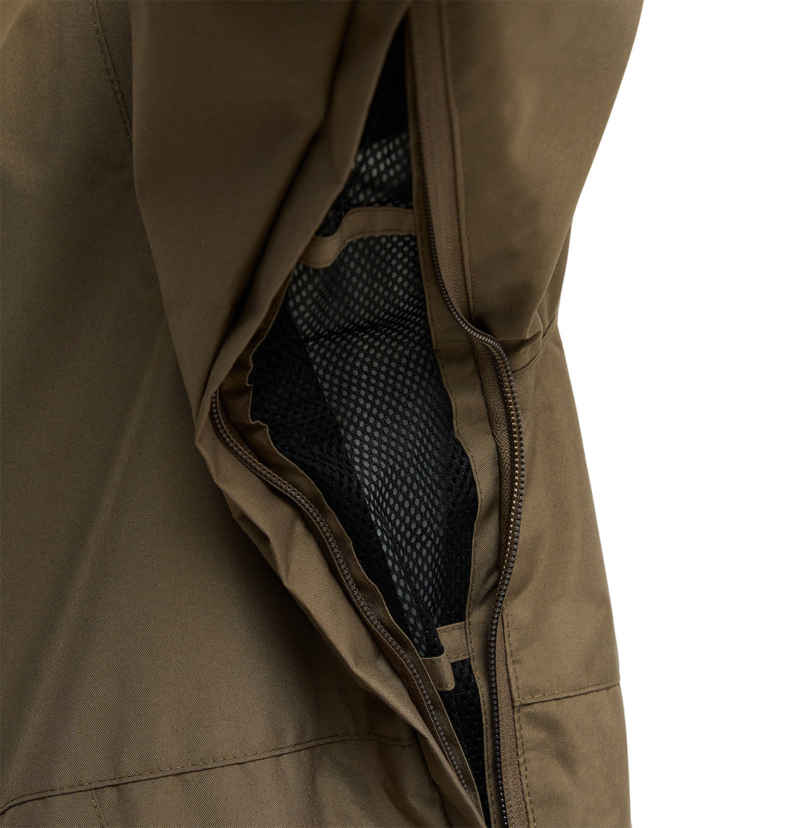 A close-up of a brown DC Shoes Basis Jacket 10K sleeve with an open zipper reveals a black mesh lining inside. Set against a plain white background, the details of this insulated, breathable jacket stand out.