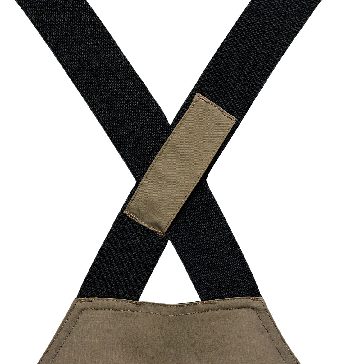 Close-up of two black fabric straps crossing and sewn together with a rectangular tan patch, attached to matching tan fabric below—part of the DC Shoes Mountain Lab Bib 20K, designed for breathable protection and reliable snow performance.