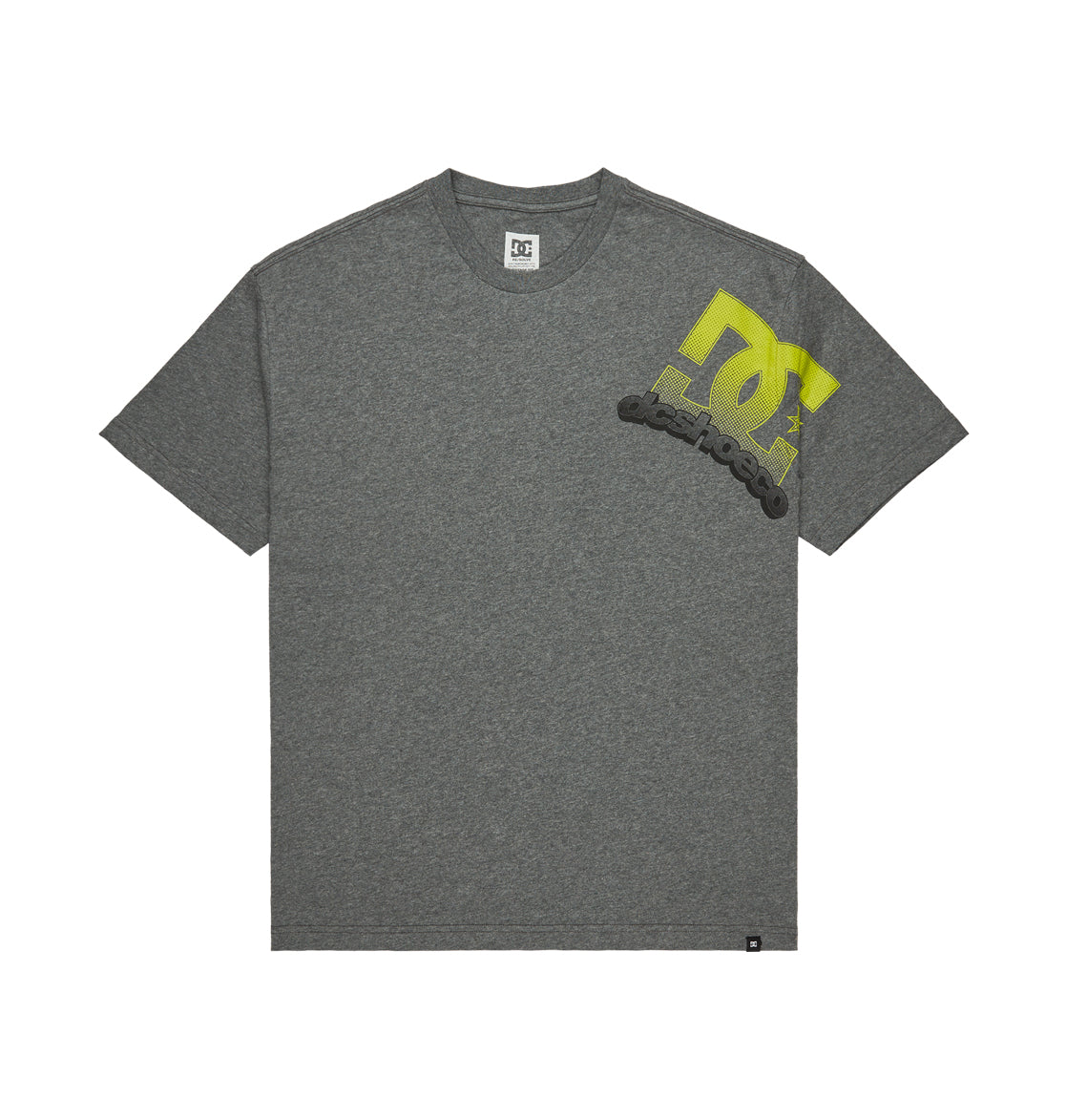 The Men’s Solid Lefty Heritage Short Sleeve Shirt by DC Shoes features a gray colorway with a bold yellow DC Shoes logo and black text on the upper left chest, reflecting classic skate heritage. The shirt is displayed laid flat against a white background.